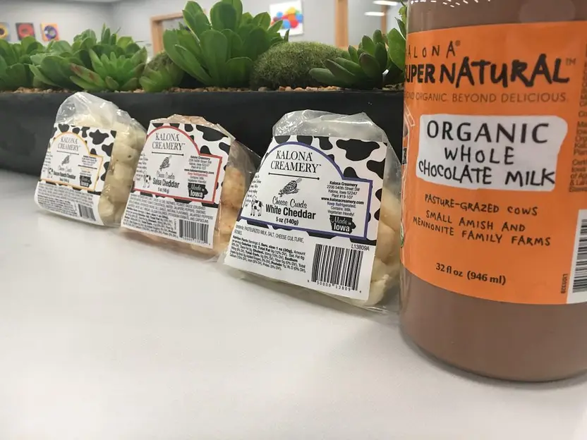 Cheese Curds with bottle of Organic Whole Chocolate milk.